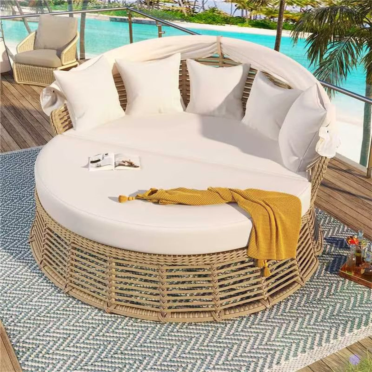 Rattan outdoor daybed with retractable canopy on a patio